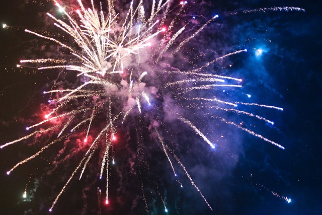 Colorful fireworks lighting up the night sky over downtown Indianapolis